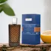 Ottoman Amber 100ml Eau de Parfum by The Merchant of Venice, showcasing an elegant amber bottle with a silver wind rose topper.