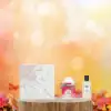 Hermès Tutti Twilly d’Hermès 2-piece set displaying the perfume and lotion against a stylish background.​