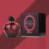 Close-up of Dior Hypnotic Poison EDP 100ml, showcasing the luxurious packaging and deep red hue.​