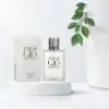 Refillable 100 ml Armani EDT on clean, aquatic-themed setup
