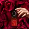 Refillable 100 ml Sì Passione EDP placed on chic background
