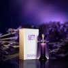 Signature feminine perfume with warm woody notes