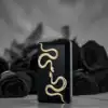Luxury clutch with gold snake and Swarovski eyes