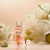 Close-up of Lancome Absolue fragrance on soft pastel backdrop