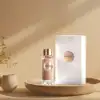 100 ml Lancome perfume near fresh rose and green moss
