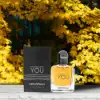 Close-up of Stronger With You Parfum showcasing deep chestnut hue