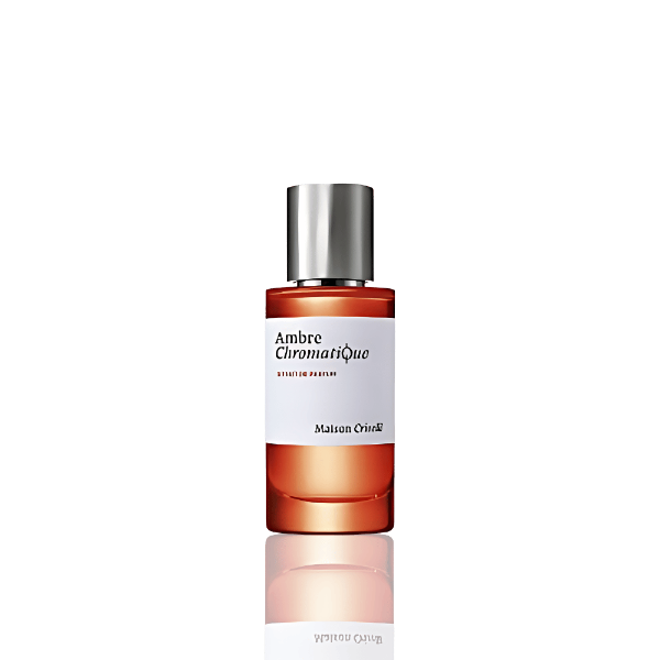 Ambre Chromatique bottle with warm amber glow