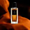 Rose and lily-of-the-valley heart over patchouli‑ambergris vanilla base