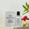Powerful unisex fragrance blending citrus, spice and rich resinous warmth