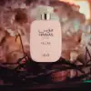 Pear and bergamot top with rose–incense heart over amber‑woody base