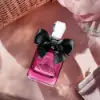 Juicy Couture Noir: fruity opening, creamy florals, rich gourmand finish