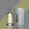 Fruity‑spice opening with citrus and plum, warm woody dry‑down