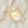 Elie Saab Shine: playful pineapple and almond heart on soft iris‑patchouli dry‑down