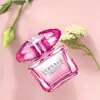 Bright Crystal Absolu: vibrant yuzu and raspberry into elegant peony‑magnolia floral heart