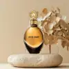 Elegant amber-floral scent with spicy lift, orange blossom heart and resinous dry‑down