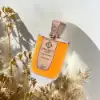 Rich gourmand extrait combining citrus, jasmine, pink pepper and warm woody toffee