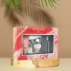 Elegant feminine fragrance with violet-powder top and cozy woody base