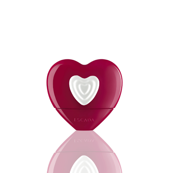 Escada Show Me Love perfume—blueberry-citrus top, rose-peony heart, and vanilla-musk base